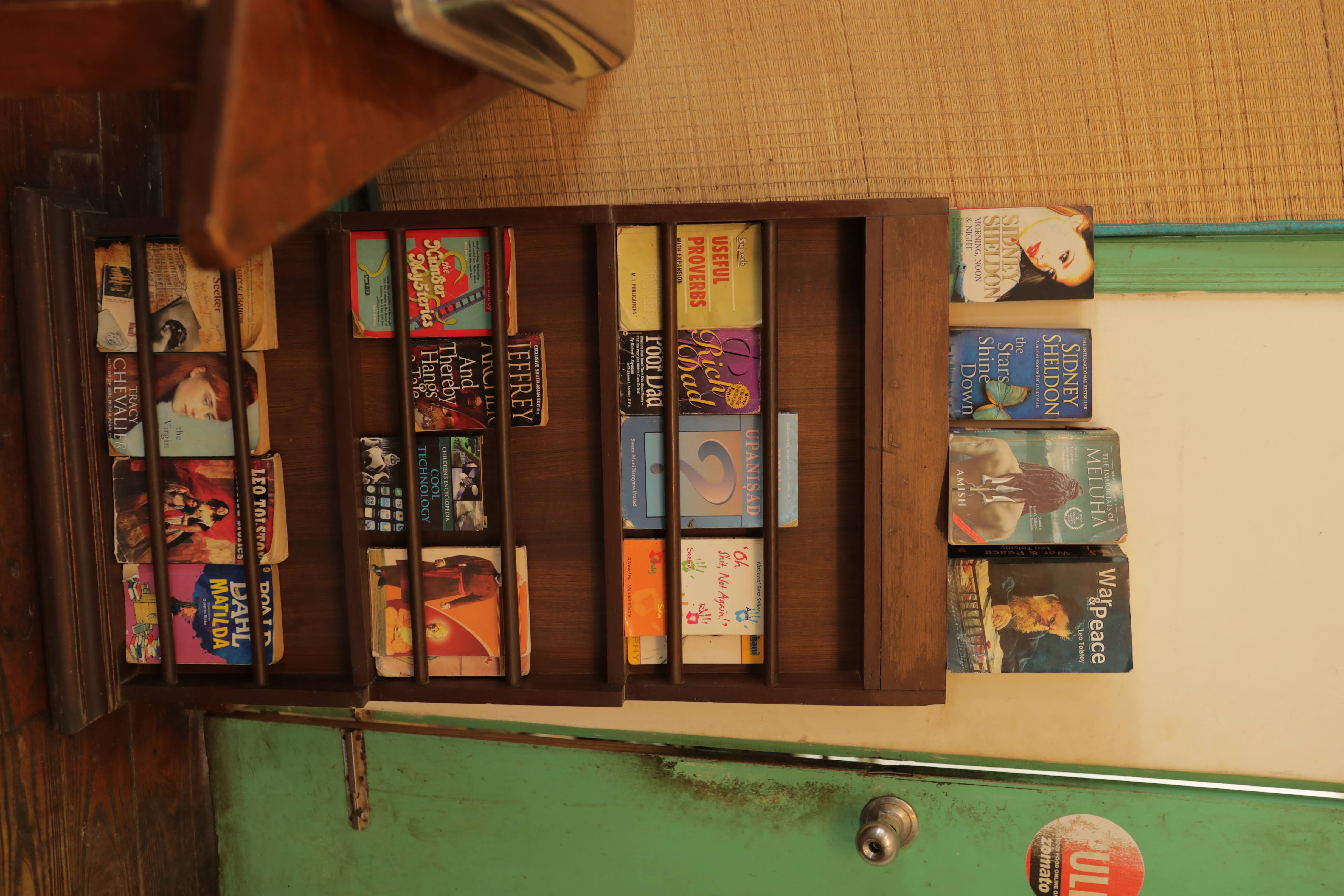 Bookshelf at Mighty Paws Cafe